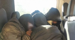 Aizturētie migranti.