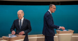 Debates. Šolcs un Mercs.