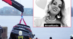 Ilonas Jaukules piemiņas foto. Izceltais BMW auto. (LETA)