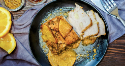 Cūkas cepetis apelsīnu mērcē.