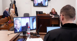 Aleksejs Rosļikovs tiesas sēdei ceturtdien bija pieslēdzies attālināti no Baltkrievijas.