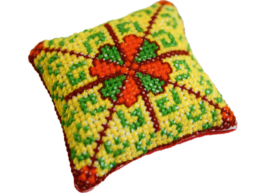 Adatu spilventiņš.