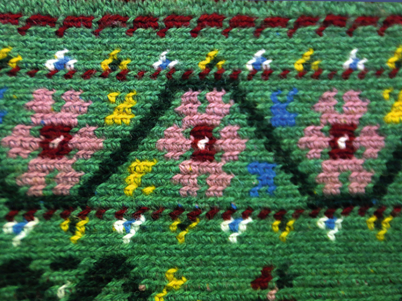 Kaklasaites motīvs.