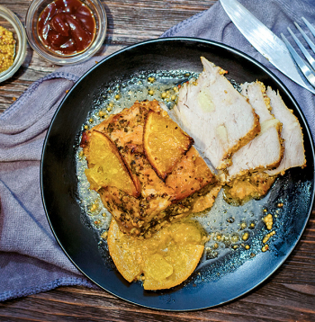 Cūkas cepetis apelsīnu mērcē.