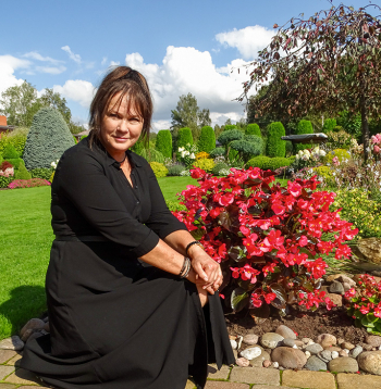 Ruta Sūniņa savā dārzā.