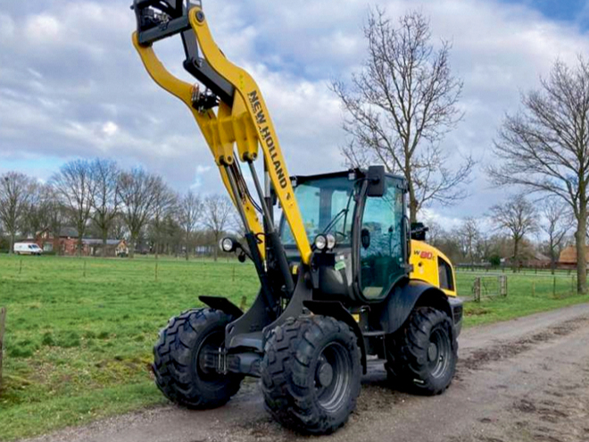 'New Holland W60C' iekrāvējs. 