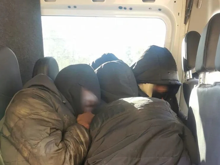Aizturētie migranti.