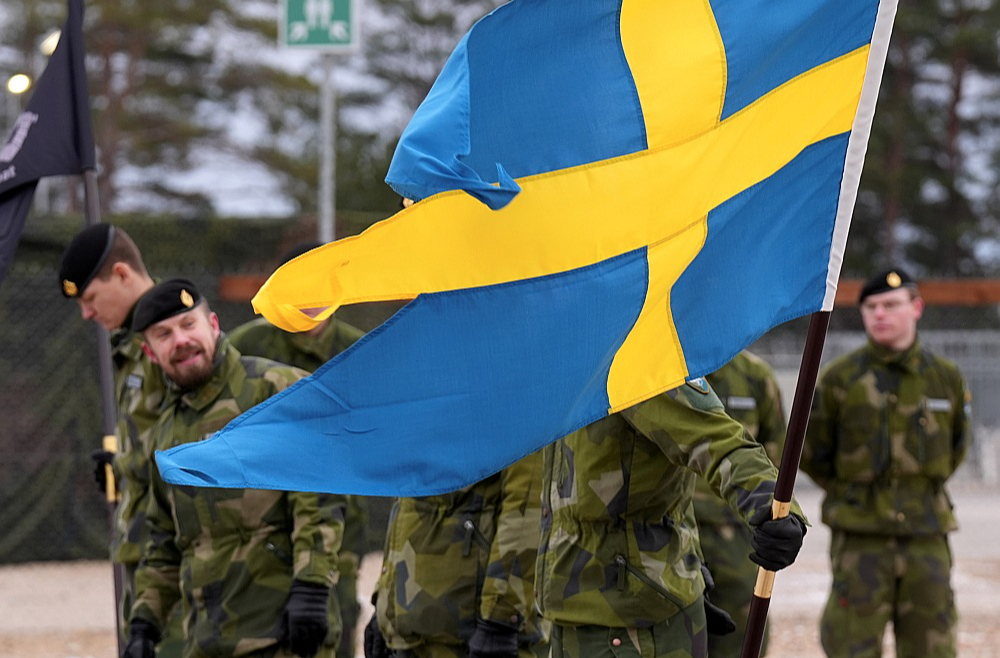 Svinīgā ceremonija militārajā bāzē "Ādaži" šī gada 7. februārī, godinot Zviedrijas karavīru pievienošanos NATO spēkiem Latvijā.