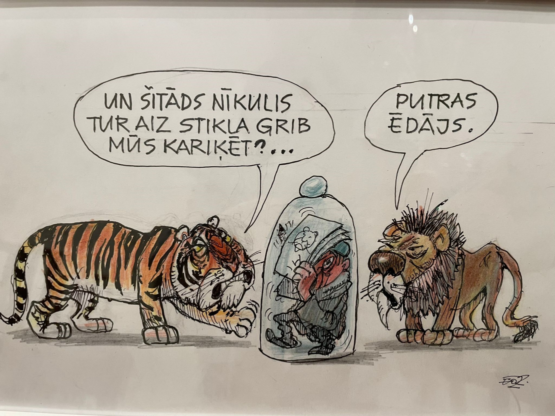 Ērika Oša karikatūra.