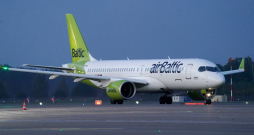 Nacionālās aviokompānijas "airBaltic" lidmašīna Rīgas lidostā. Nacionālās aviokompānijas "airBaltic" lidmašīna Rīgas lidostā.