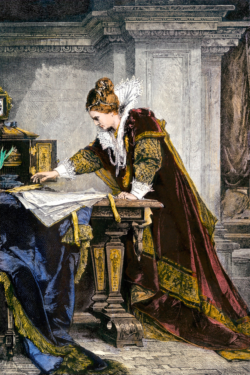 Elizabete paraksta nāves spriedumu Marijai Stjuartei. Elizabete paraksta nāves spriedumu Marijai Stjuartei.