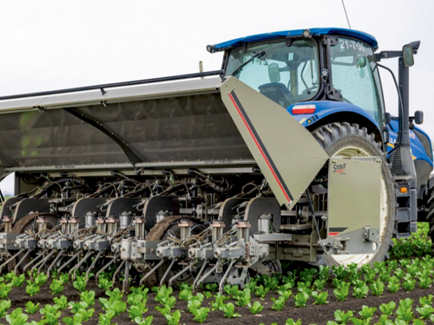 'New Holland' nezāļu robots.