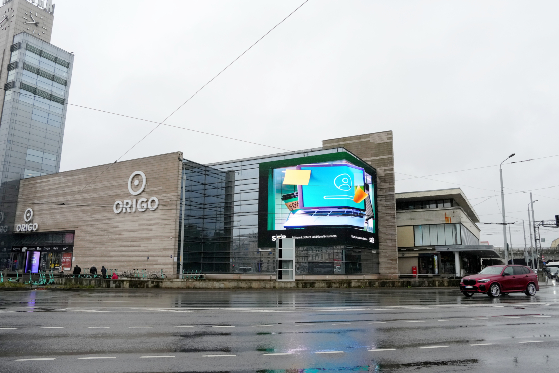"Origo" fasādes 3D digitālais ekrāns Rīgas centrā.
